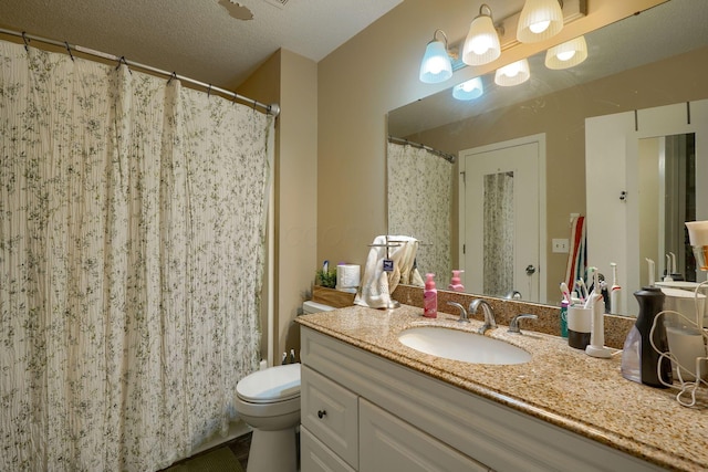 7581-7583 Pickett Ln Unit 83, Columbus, OH 43235 - bathroom with toilet, vanity, and a shower with shower curtain