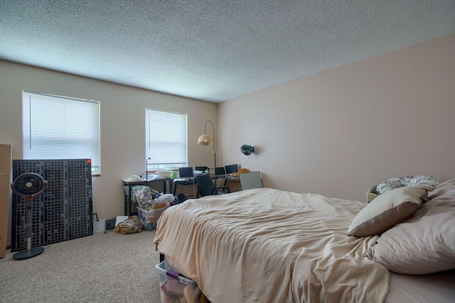 7581-7583 Pickett Ln Unit 83, Columbus, OH 43235 - bedroom featuring carpet flooring and a textured ceiling