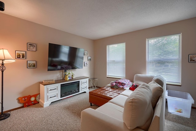 7581-7583 Pickett Ln Unit 83, Columbus, OH 43235 - living room featuring carpet flooring and baseboards