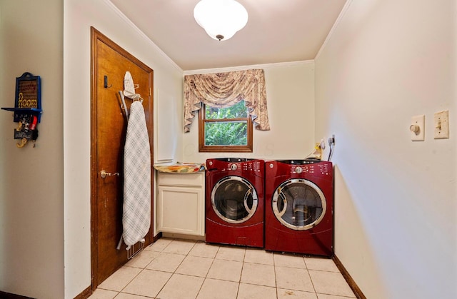 1027 Peggys Cv, Reynoldsburg, OH 43068 - washroom with separate washer and dryer, cabinet space, crown molding, light tile patterned floors, and baseboards