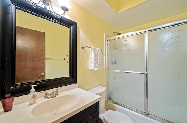 1027 Peggys Cv, Reynoldsburg, OH 43068 - bathroom with toilet, vanity, and combined bath / shower with glass door