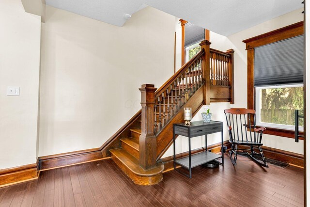 540 Linwood Ave, Columbus, OH 43205 - stairs with hardwood / wood-style flooring and baseboards