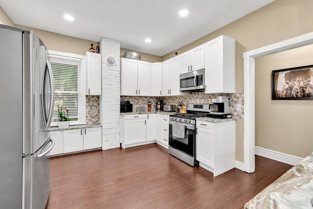 540 Linwood Ave, Columbus, OH 43205 - kitchen featuring stainless steel appliances, tasteful backsplash, dark wood-style flooring, white cabinetry, and recessed lighting