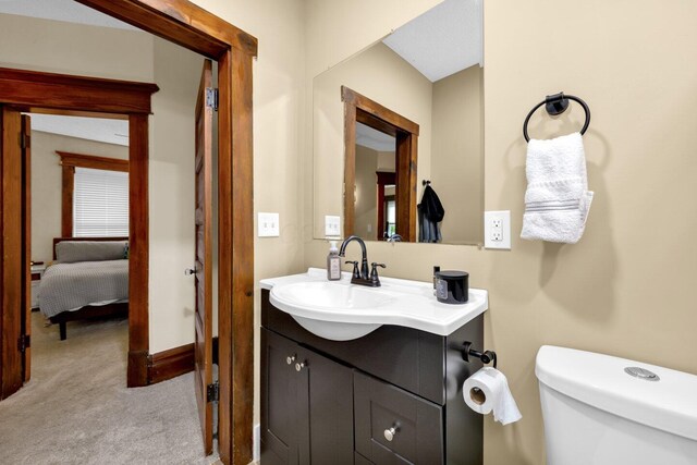 540 Linwood Ave, Columbus, OH 43205 - ensuite bathroom featuring vanity, toilet, and baseboards