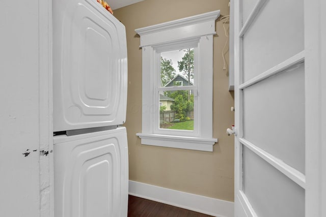 540 Linwood Ave, Columbus, OH 43205 - interior space with estacked washer and dryer, baseboards, and dark wood-style flooring