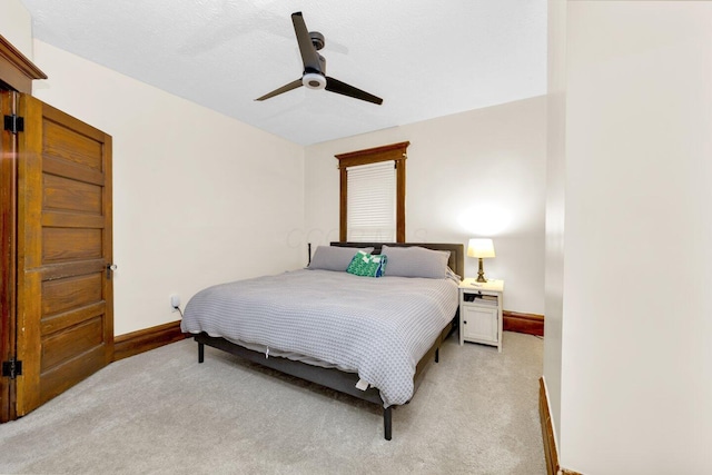 540 Linwood Ave, Columbus, OH 43205 - bedroom featuring baseboards, light carpet, and ceiling fan