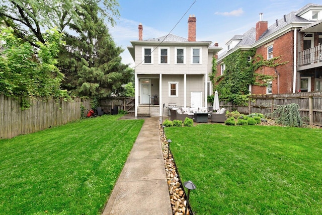 540 Linwood Ave, Columbus, OH 43205 - back of property with an outdoor living space and a chimney