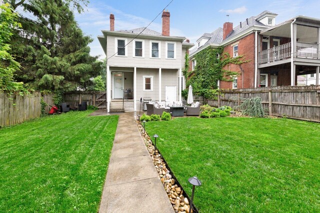 540 Linwood Ave, Columbus, OH 43205 - rear view of property with outdoor lounge area, a patio area, and a chimney