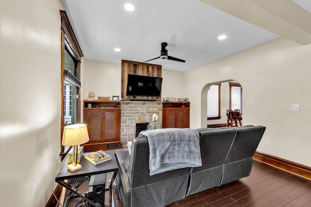 540 Linwood Ave, Columbus, OH 43205 - living room featuring arched walkways, a ceiling fan, baseboards, dark wood finished floors, and recessed lighting