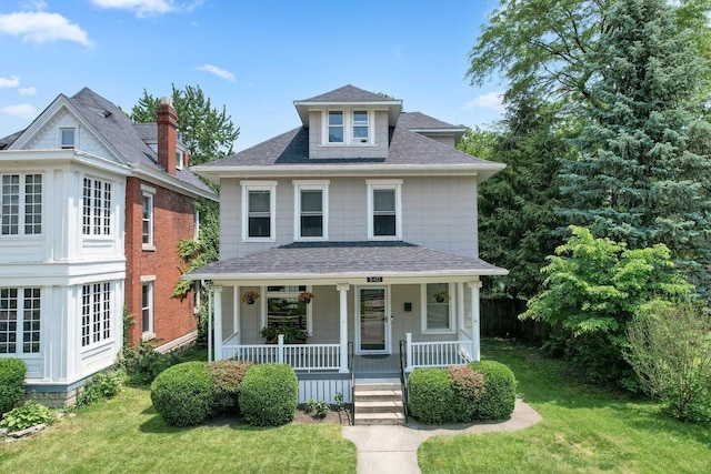 540 Linwood Ave, Columbus, OH 43205 - american foursquare style home with a shingled roof, covered porch, and a front lawn