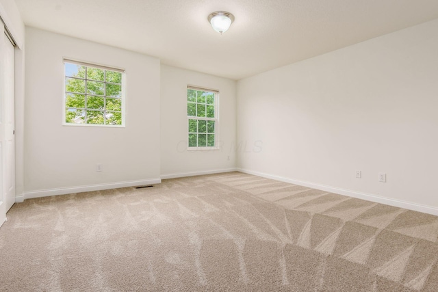 6618 Wild Rose Ln, Westerville, OH 43082 - unfurnished room featuring baseboards and light colored carpet