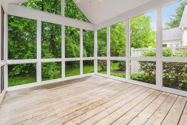 6618 Wild Rose Ln, Westerville, OH 43082 - unfurnished sunroom with a deck, vaulted ceiling, wood finished floors, and ceiling fan