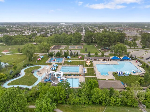 6034 Heritage View Ct, Hilliard, OH 43026 - drone / aerial view of a pool area and a tree filled landscape