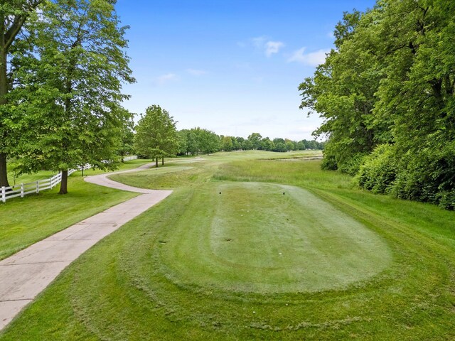 6034 Heritage View Ct, Hilliard, OH 43026 - view of community with a putting green and view of wooded area