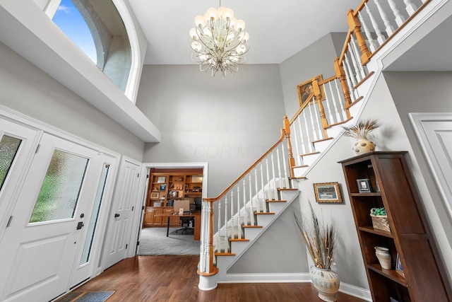 6034 Heritage View Ct, Hilliard, OH 43026 - foyer entrance with a high ceiling, stairs, wood finished floors, and plenty of natural light