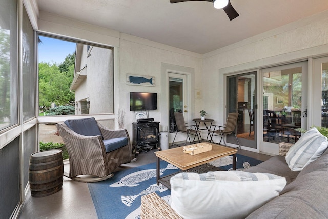 6034 Heritage View Ct, Hilliard, OH 43026 - living room with a wood stove and a ceiling fan