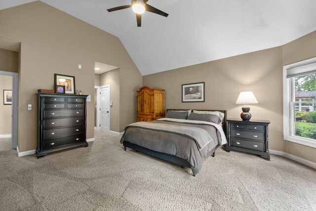 6034 Heritage View Ct, Hilliard, OH 43026 - bedroom with vaulted ceiling, carpet flooring, baseboards, ceiling fan, and ensuite bath