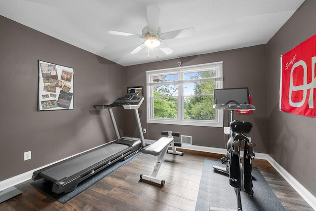 6034 Heritage View Ct, Hilliard, OH 43026 - workout area featuring wood finished floors, ceiling fan, and baseboards