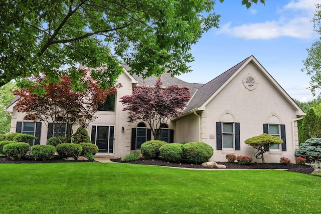 6034 Heritage View Ct, Hilliard, OH 43026 - view of front of property featuring a front lawn and stucco siding