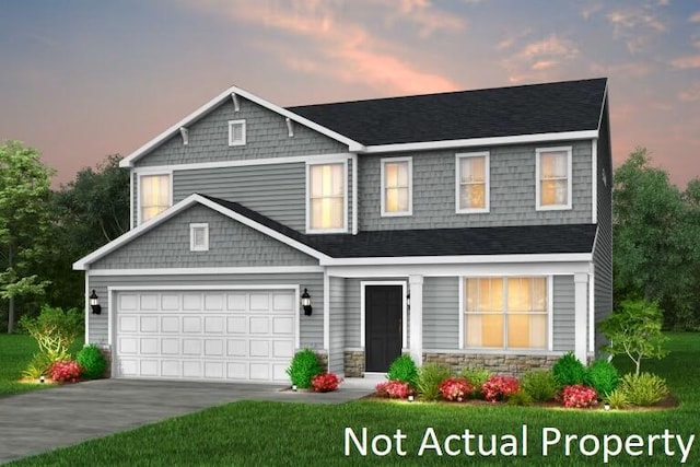 520 Penwell Dr Lot 13897, Delaware, OH 43015 - craftsman-style home with driveway, a yard, and roof with shingles