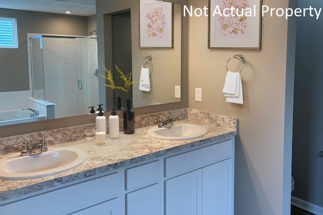 520 Penwell Dr Lot 13897, Delaware, OH 43015 - bathroom with a stall shower, double vanity, and a garden tub