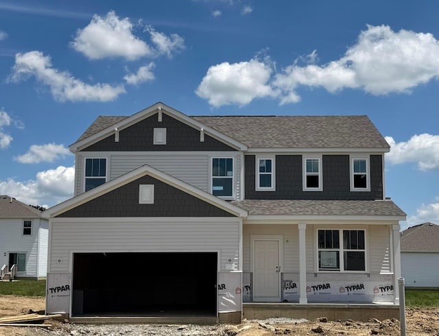 520 Penwell Dr Lot 13897, Delaware, OH 43015 - view of front facade with a porch, an attached garage, and roof with shingles