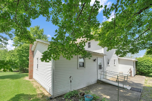 7682 Northridge Rd, Johnstown, OH 43031 - rear view of house featuring a lawn and a patio
