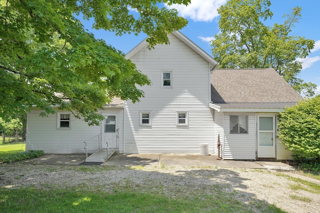 7682 Northridge Rd, Johnstown, OH 43031 - rear view of house featuring roof with shingles