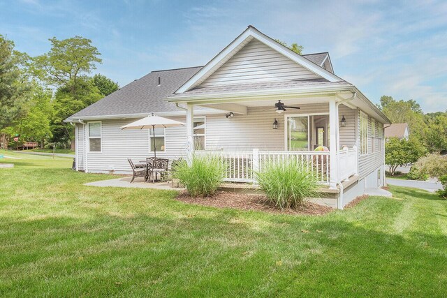 51 Appletree Ct, Howard, OH 43028 - rear view of property with a yard, a ceiling fan, a shingled roof, and a patio area