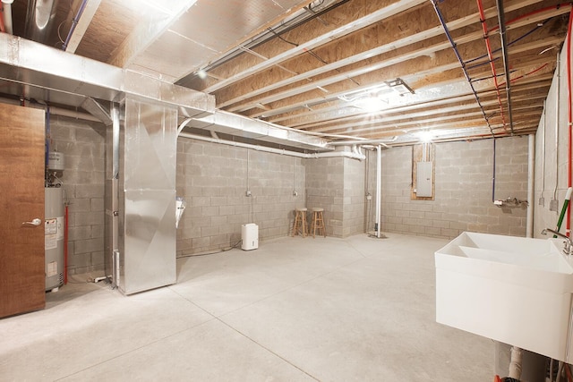 51 Appletree Ct, Howard, OH 43028 - unfinished basement featuring water heater, electric panel, a sink, and heating unit