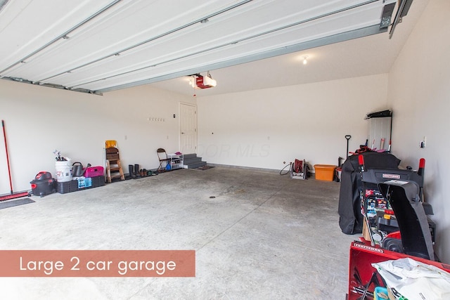 51 Appletree Ct, Howard, OH 43028 - garage with a garage door opener