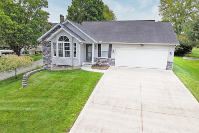 51 Appletree Ct, Howard, OH 43028 - ranch-style house with an attached garage, concrete driveway, a front lawn, a chimney, and stone siding