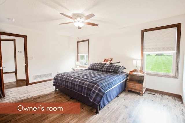 51 Appletree Ct, Howard, OH 43028 - bedroom with baseboards, wood finished floors, and ceiling fan