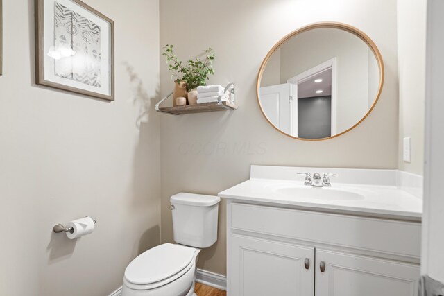 2505 Isabella Blue Dr, Powell, OH 43065 - bathroom with toilet, vanity, and baseboards