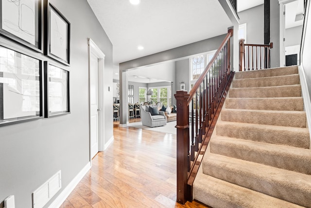 2505 Isabella Blue Dr, Powell, OH 43065 - stairway with hardwood / wood-style floors, recessed lighting, and baseboards