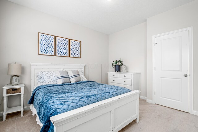 2505 Isabella Blue Dr, Powell, OH 43065 - bedroom featuring light carpet and baseboards