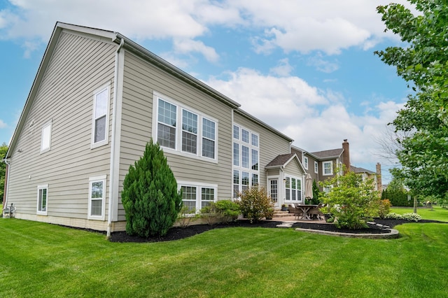 2505 Isabella Blue Dr, Powell, OH 43065 - back of house with a yard and a patio