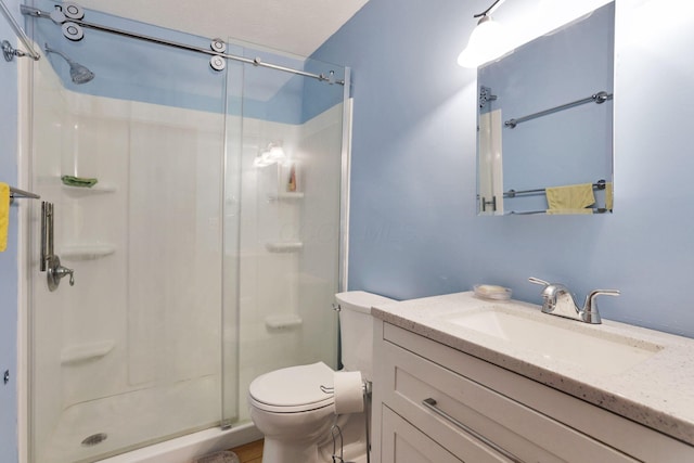 991 Annagladys Dr Unit R4, Columbus, OH 43085 - bathroom with a stall shower, vanity, and toilet