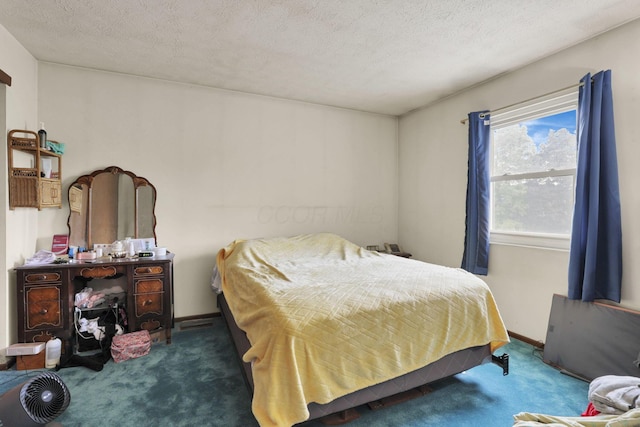 991 Annagladys Dr Unit R4, Columbus, OH 43085 - carpeted bedroom with a textured ceiling
