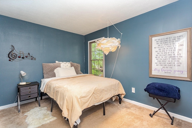1315 Shelby Cir, Reynoldsburg, OH 43068 - bedroom featuring baseboards and light carpet