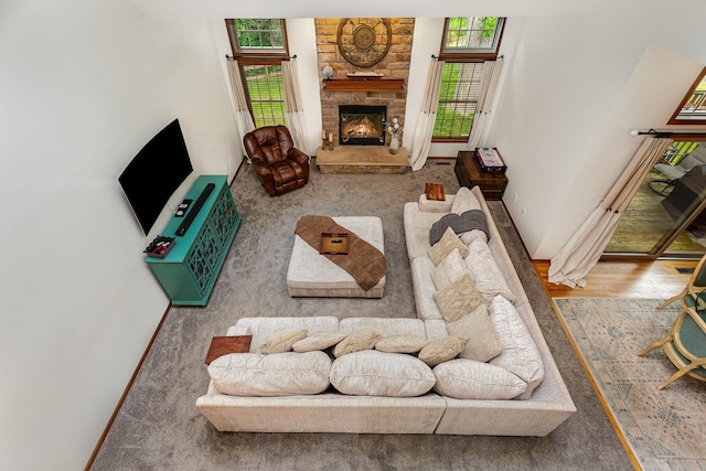 1315 Shelby Cir, Reynoldsburg, OH 43068 - living room with a stone fireplace and wood finished floors