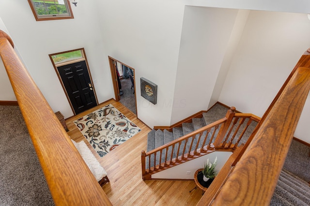 1315 Shelby Cir, Reynoldsburg, OH 43068 - foyer entrance featuring stairs, wood finished floors, and a towering ceiling