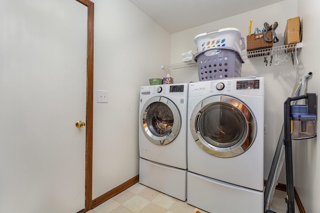 1315 Shelby Cir, Reynoldsburg, OH 43068 - laundry area with washer and dryer and light floors