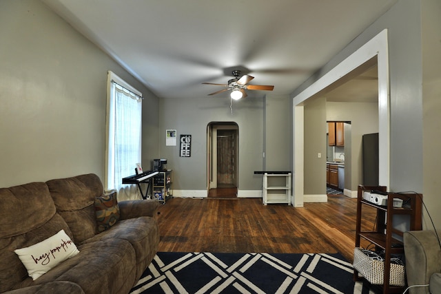 368 Alden Ave Unit 368, Columbus, OH 43201 - living area featuring arched walkways, dark wood-style flooring, ceiling fan, and baseboards