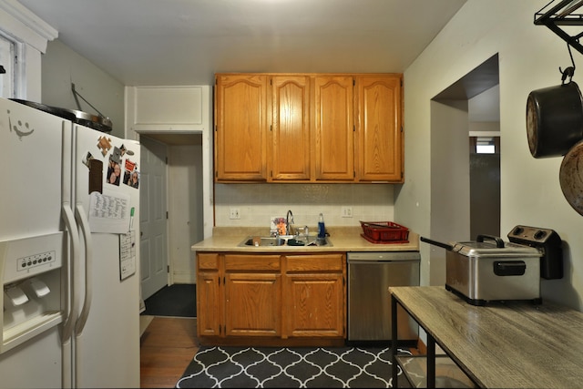 368 Alden Ave Unit 368, Columbus, OH 43201 - kitchen featuring white fridge with ice dispenser, dishwasher, a sink, light countertops, and tasteful backsplash