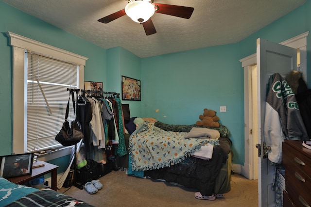 368 Alden Ave Unit 368, Columbus, OH 43201 - bedroom featuring carpet floors, a textured ceiling, and ceiling fan