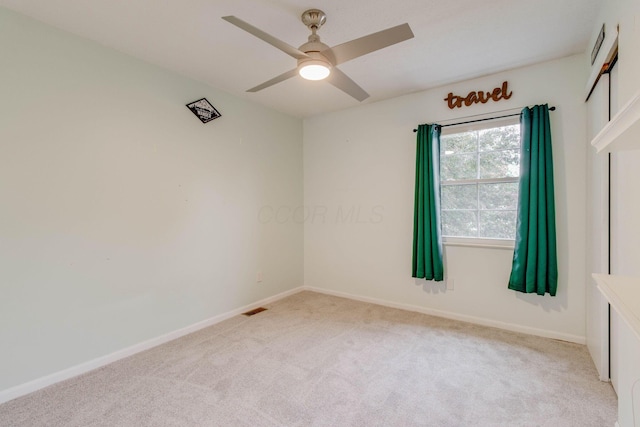 4071 Killary Dr, Dublin, OH 43016 - unfurnished room with light carpet, ceiling fan, and baseboards