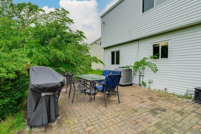 4071 Killary Dr, Dublin, OH 43016 - view of patio / terrace featuring central air condition unit, grilling area, and outdoor dining area