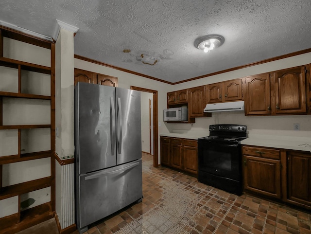15828 Hedges Rd, Laurelville, OH 43135 - kitchen with freestanding refrigerator, black electric range oven, white microwave, range hood, and light countertops