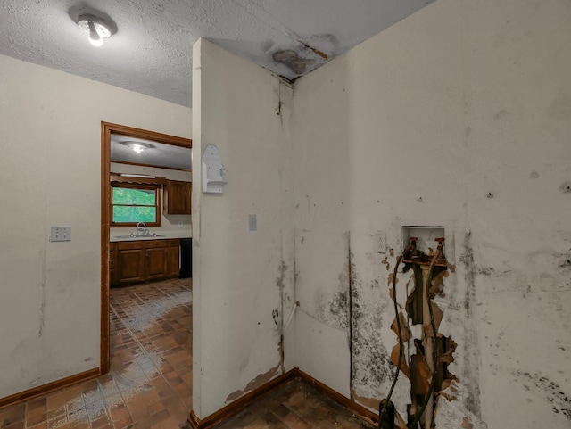 15828 Hedges Rd, Laurelville, OH 43135 - hall with brick patterned floors and a textured ceiling